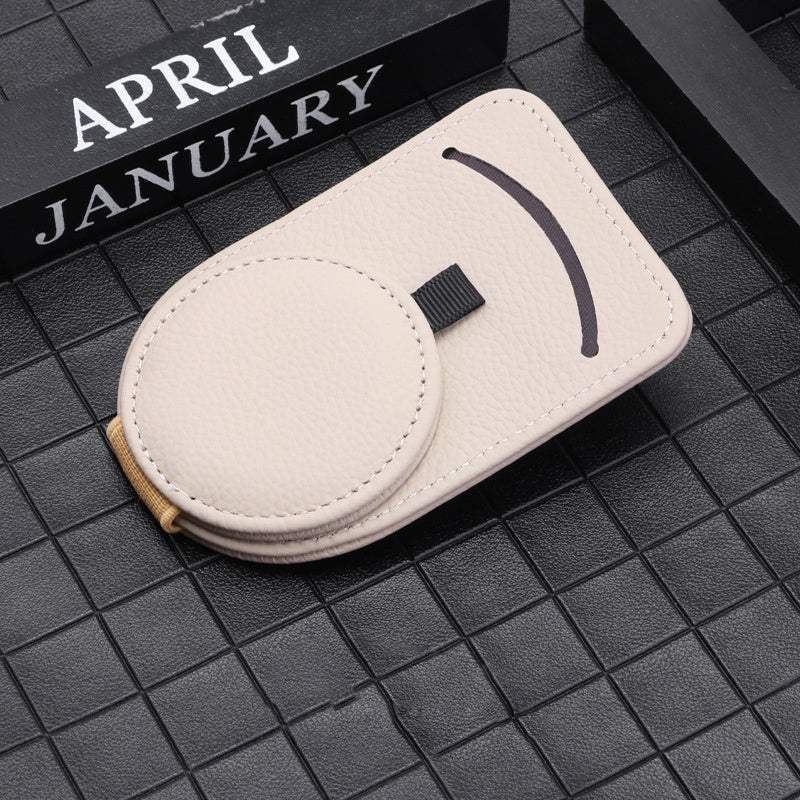 Clip In, Drive On with This Sleek Visor Glasses Holder